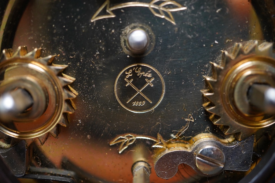 A French brass repeating carriage clock, together with another enamelled dial carriage clock, both with keys, tallest 15cm. Condition - not tested